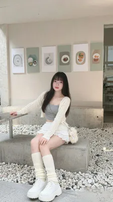 A woman taking a break at a bright cafe